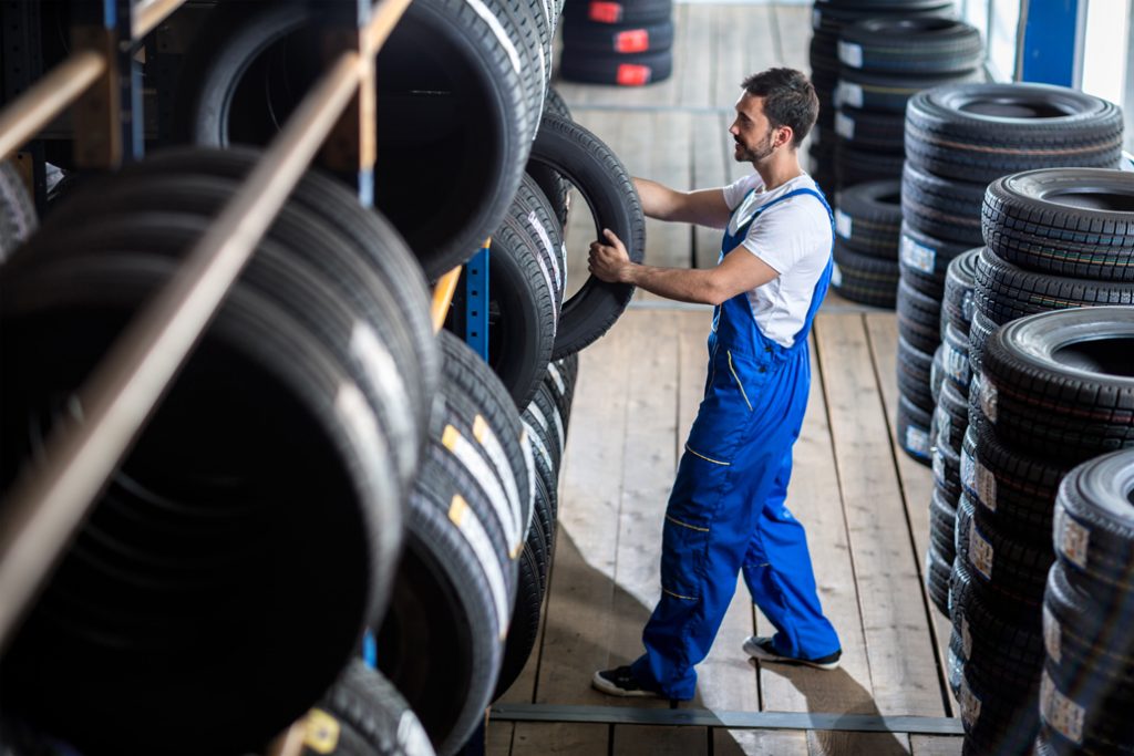 A worker in a tyre factory